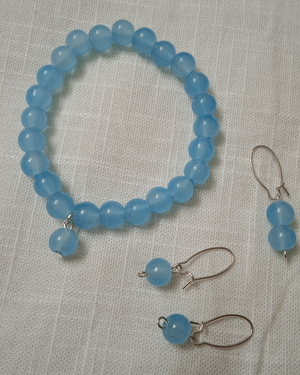 Blue beaded bracelate with ear rings